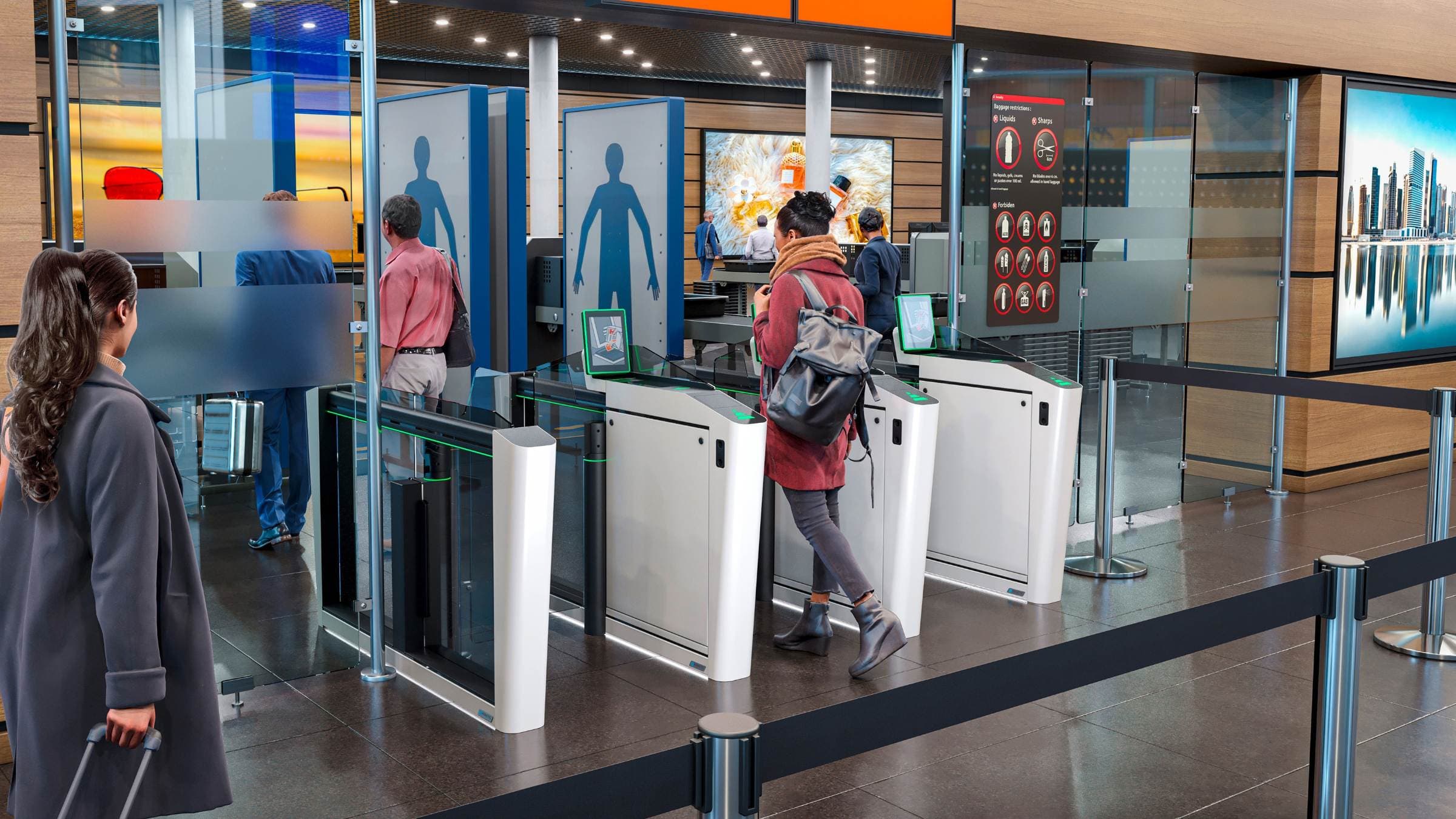 A row of automated passenger eGates with glass barriers in a bright modern airport terminal, one central lane open